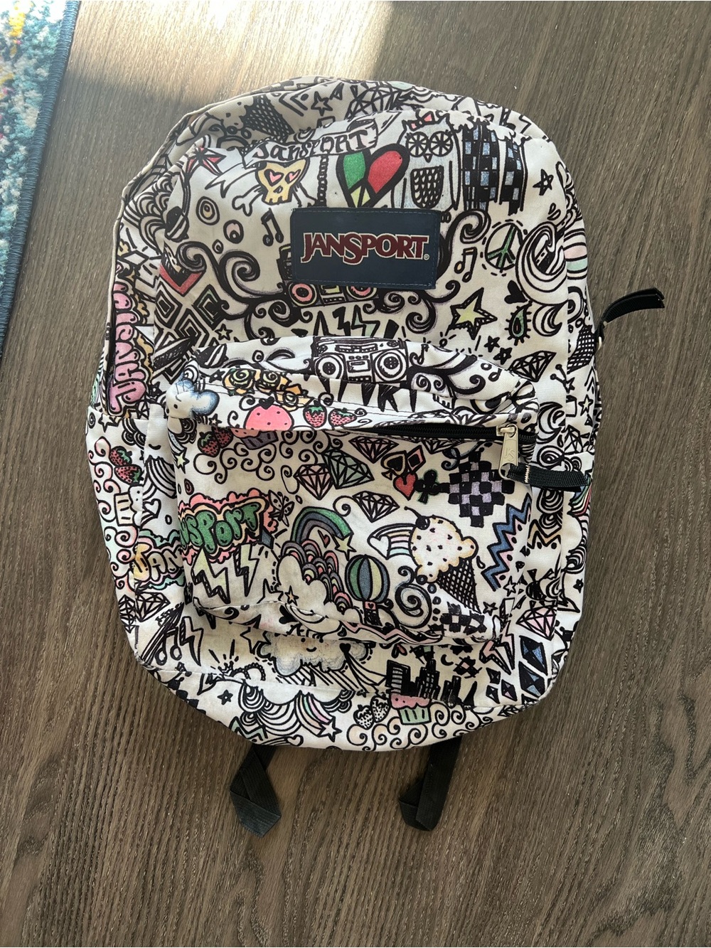 Jansport White Backpack with Multicolor Doodle Graphics